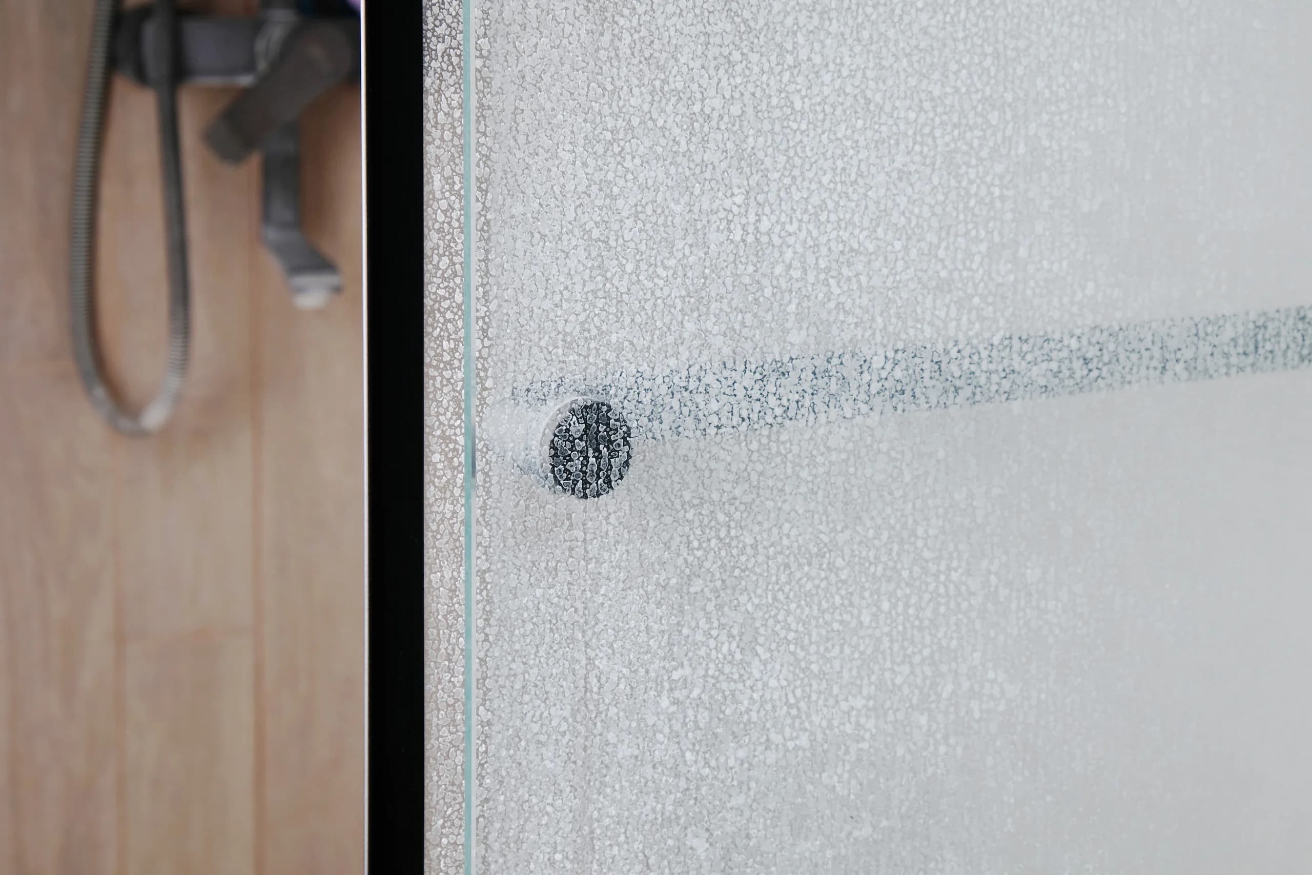How to Remove Hard Water Stains from Glass Shower Doors