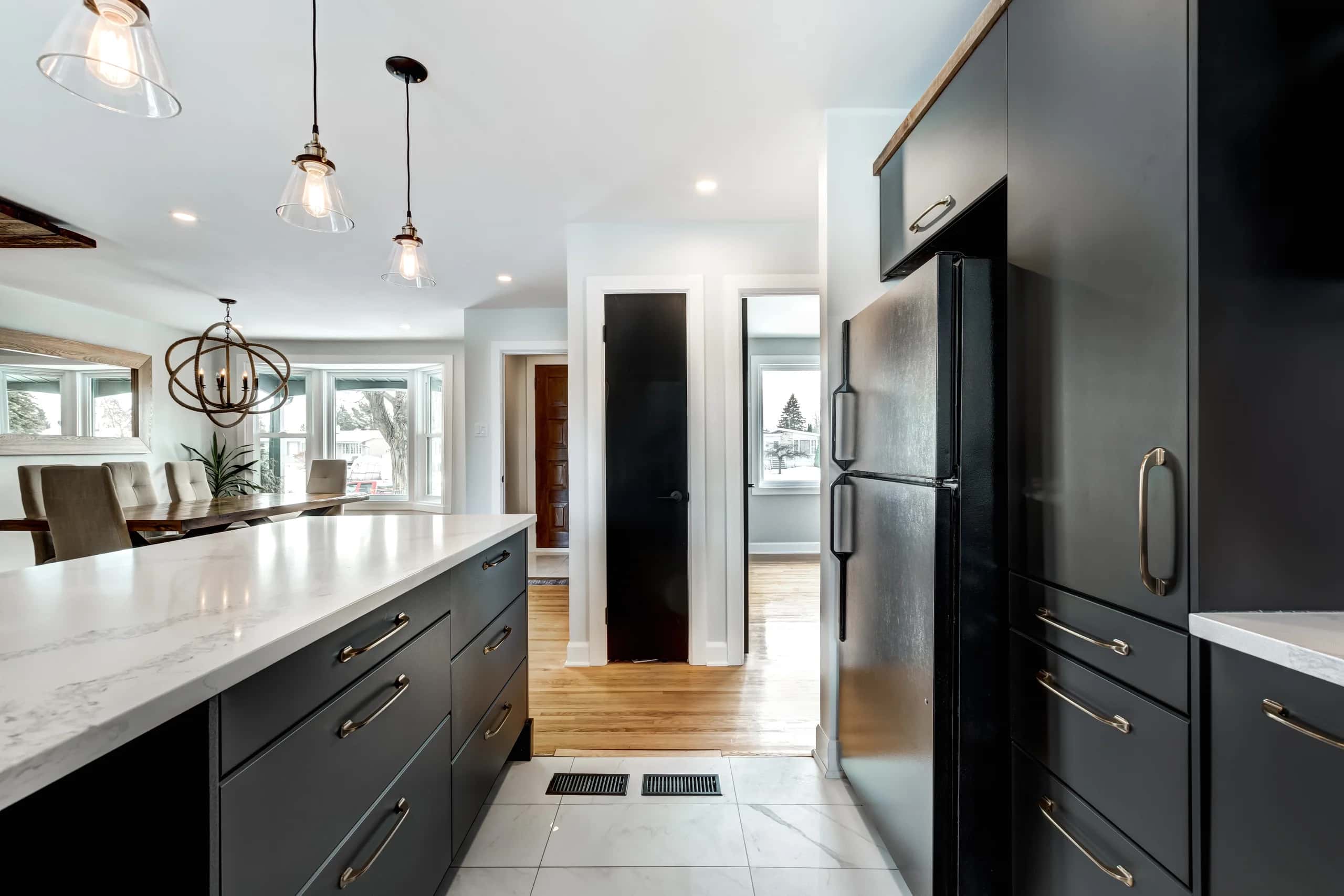 Does a 50% U.S. Tariff Mean Your Renovation Costs 50% More? No. Here's Who Actually Pays, and What Canadians Felt Last Time