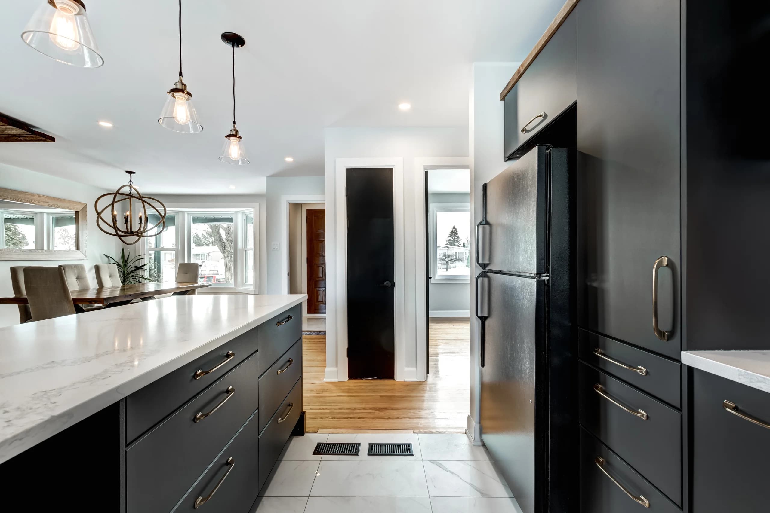 Does a 50% U.S. Tariff Mean Your Renovation Costs 50% More? No. Here's Who Actually Pays, and What Canadians Felt Last Time